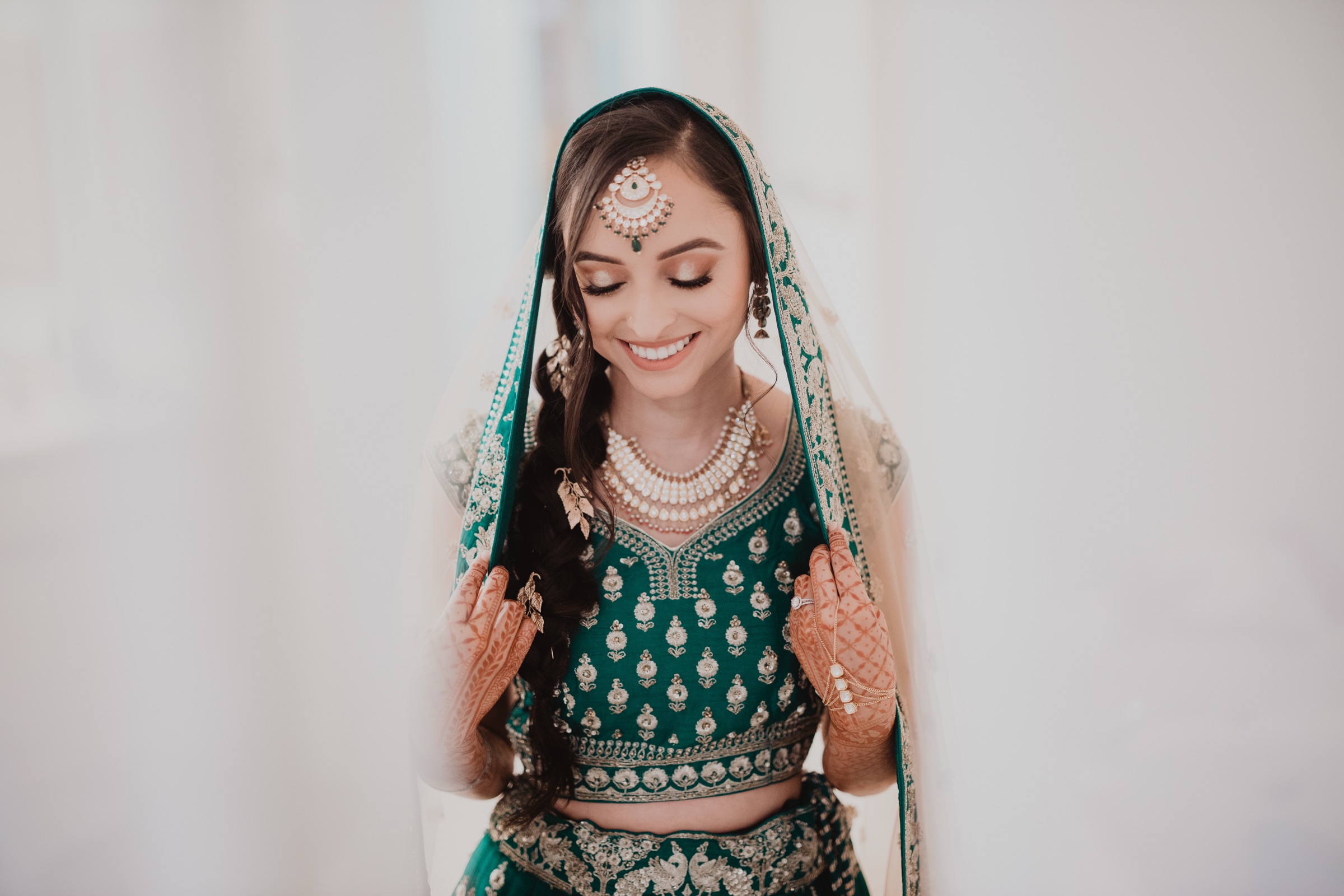Bride in colorful South Asian wedding attire