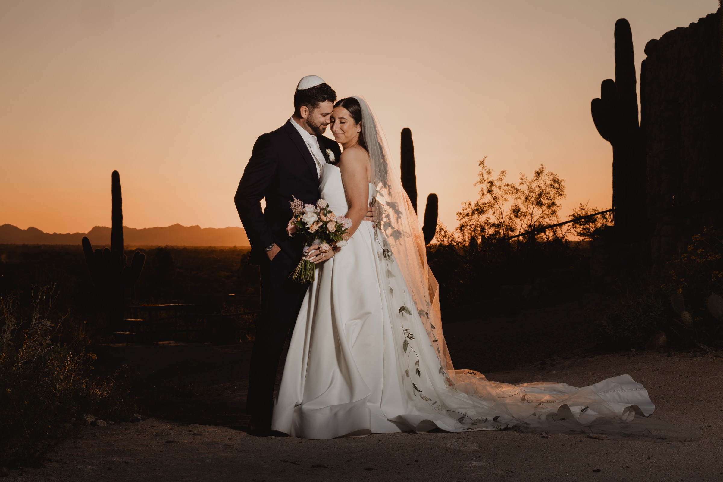 Couple photographed together in warm Arizona desert light