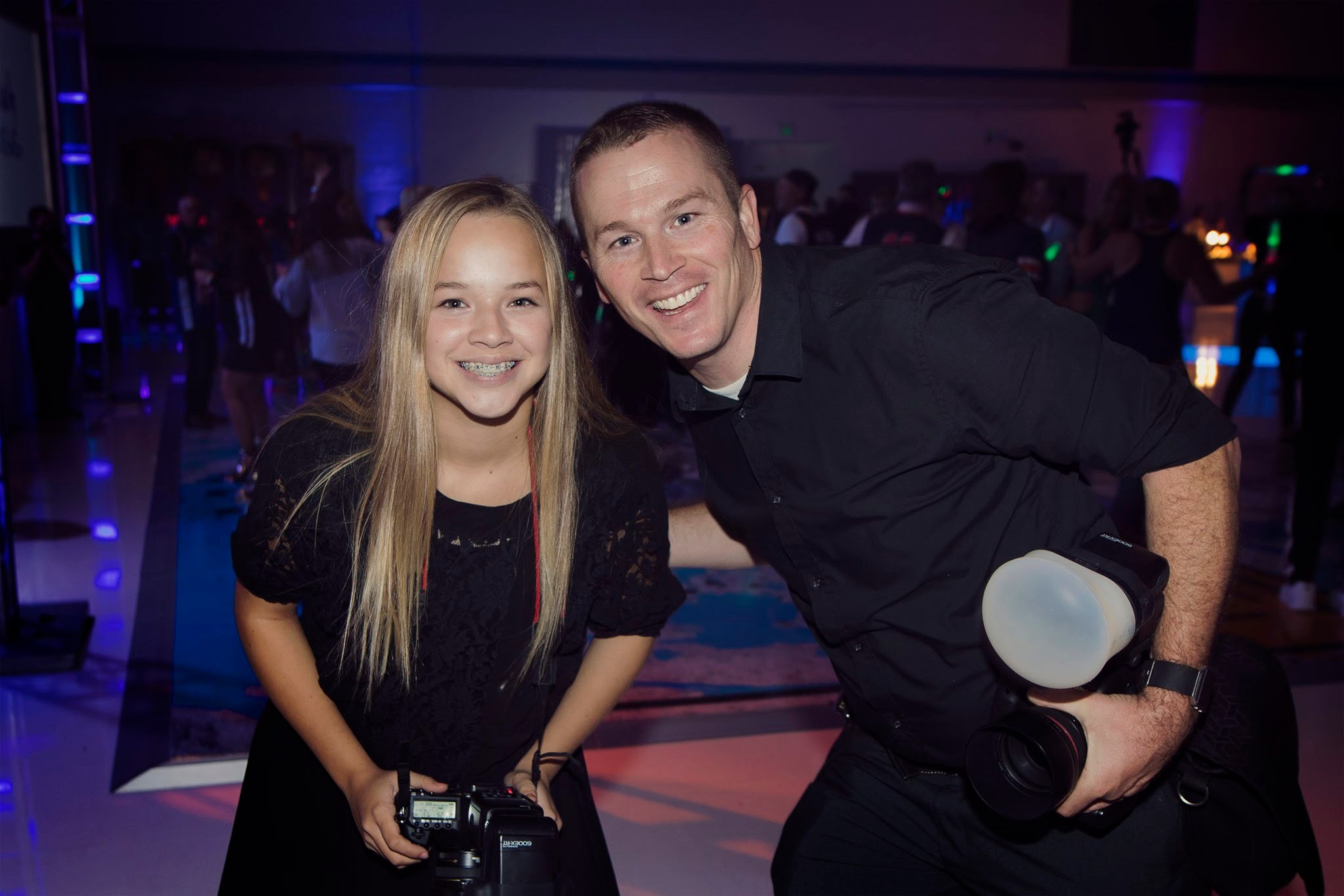 Trevor Dayley with his daughter Katelyn while photographing a Bar Mitzvah