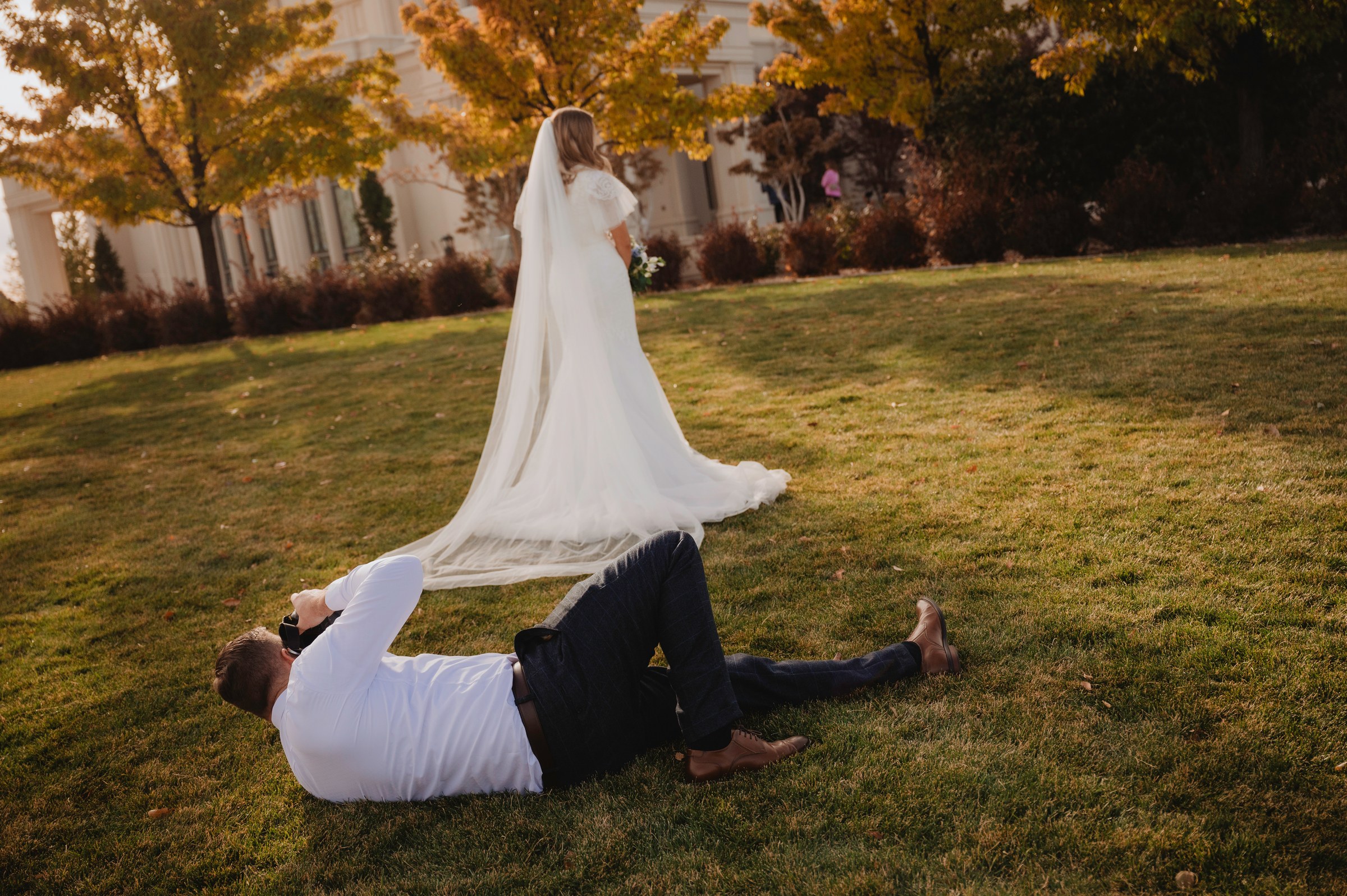 Trevor Dayley photographing from the ground during a wedding