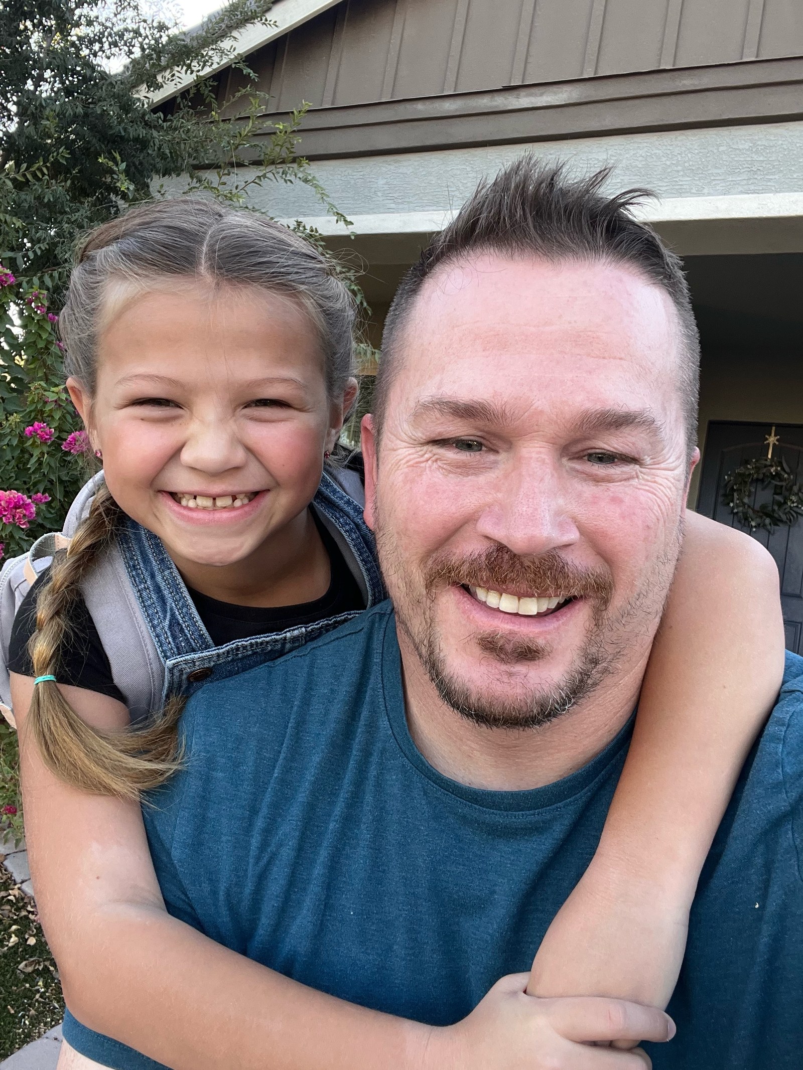 Trevor Dayley with his youngest daughter