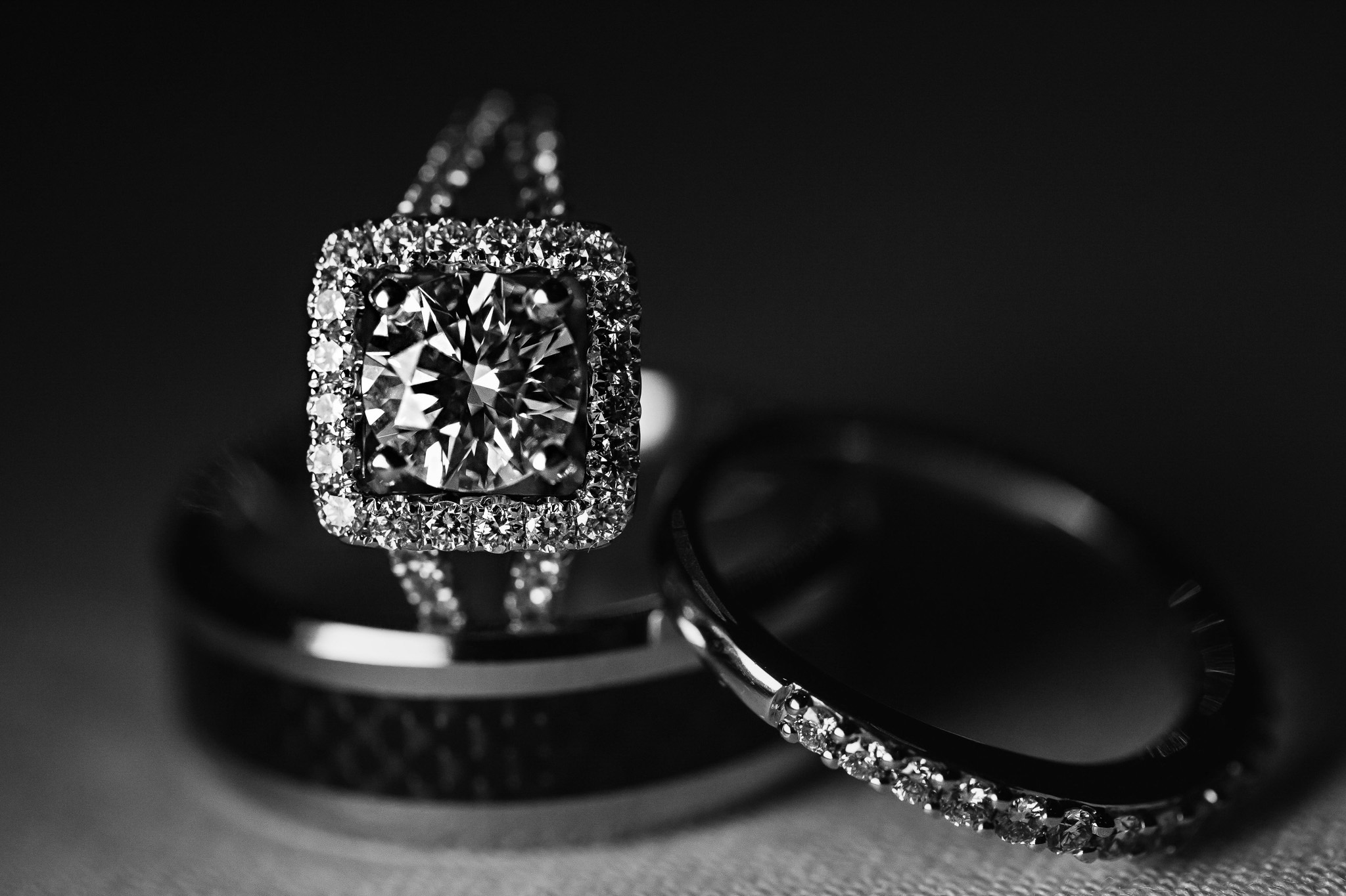 Wedding rings photographed close in black and white