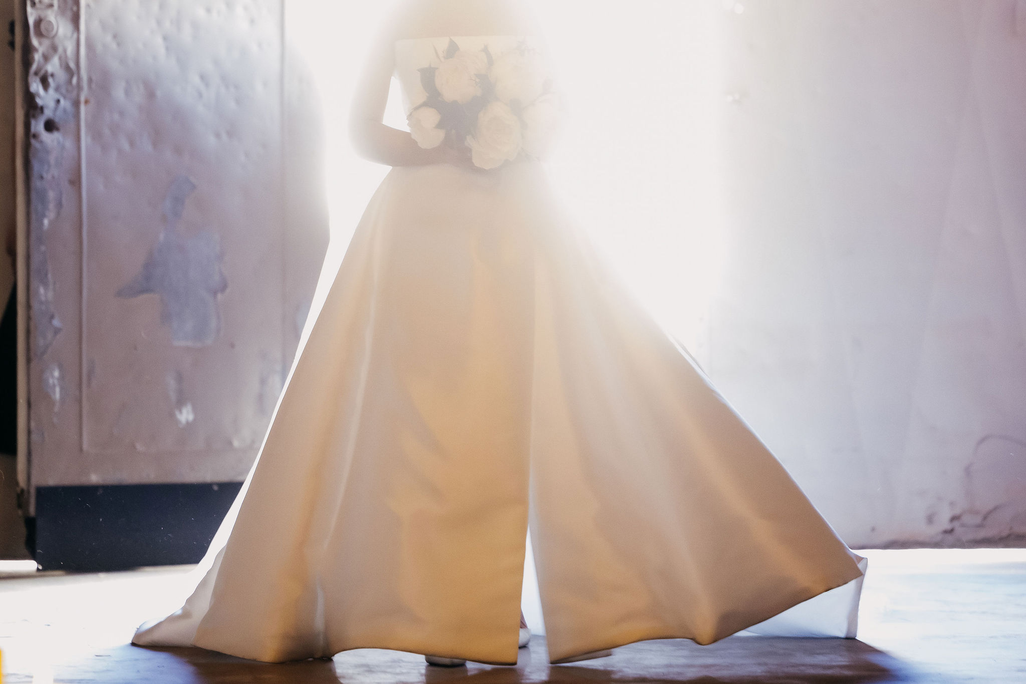 Indoor wedding ceremony at The Croft with reflective polished floors
