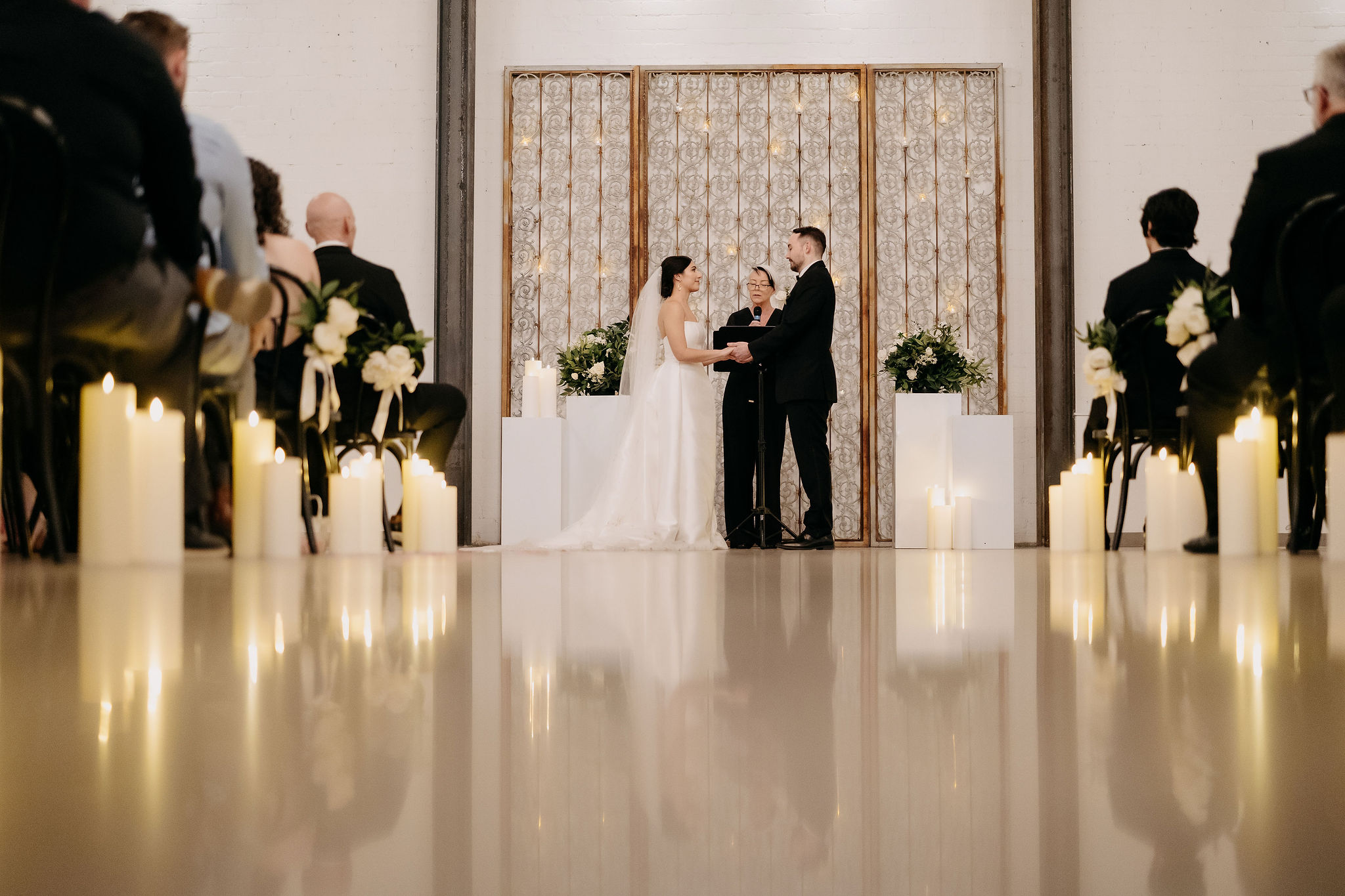 Alexa and Jerome exchanging vows inside The Croft