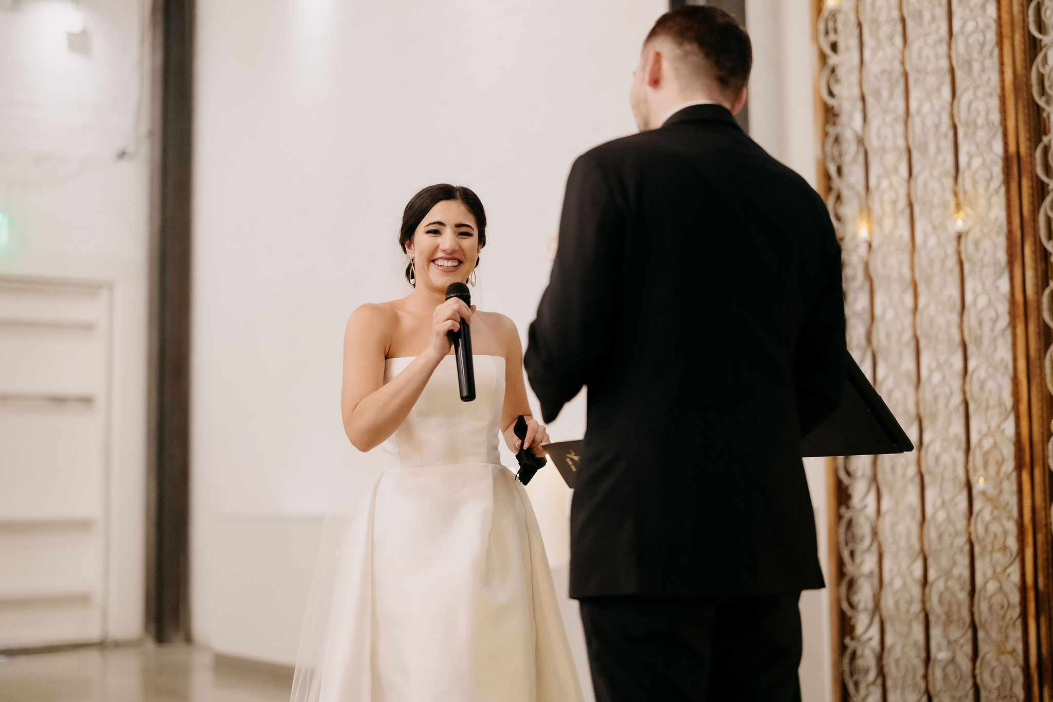 Alexa and Jerome walking back down the aisle at The Croft