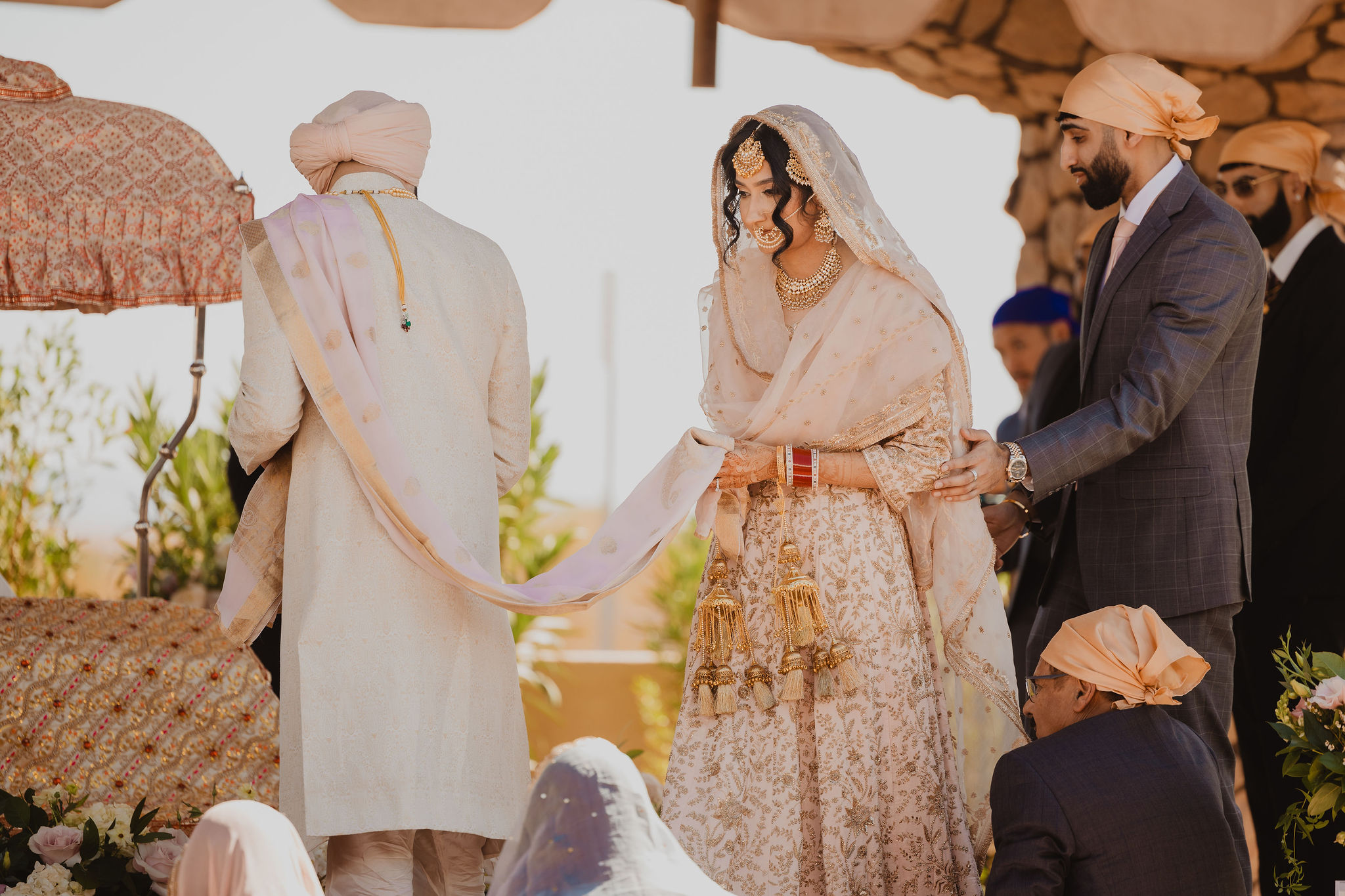 Ceremony near the Superstition Mountains photograph from Amrit and Yousef’s wedding celebration