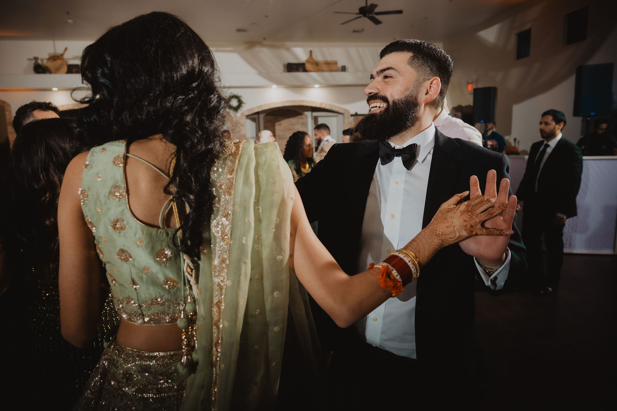 Evening portraits and reception dance floor photograph from Amrit and Yousef’s wedding celebration