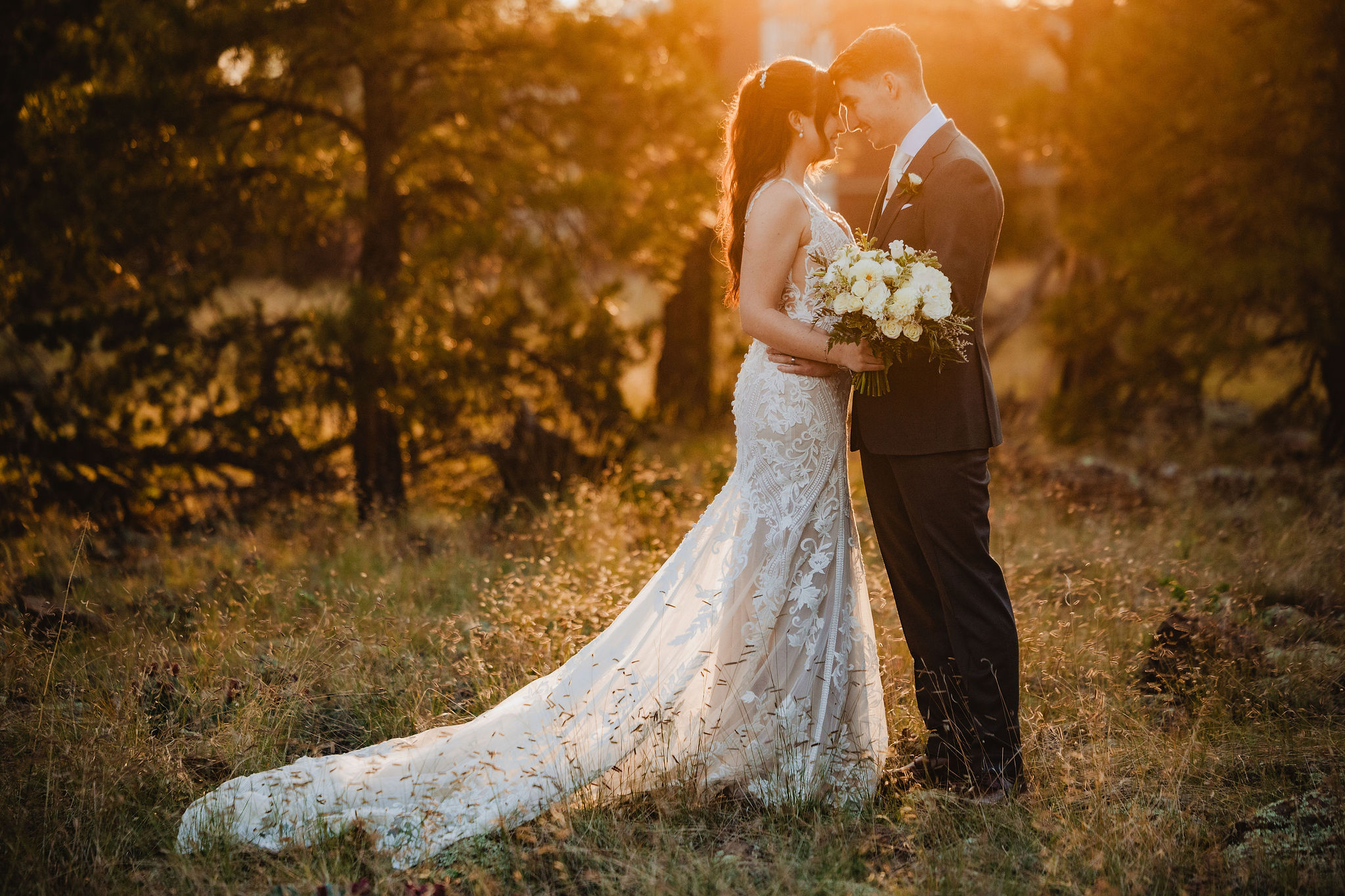 Brittney and Trevor in golden light at Little America Hotel in Flagstaff