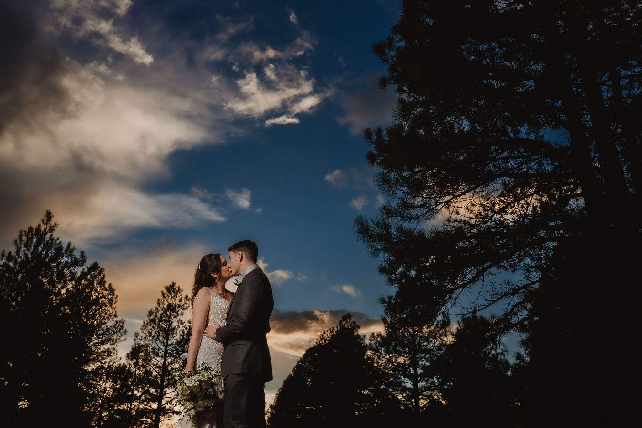 Brittney and Trevor under dramatic Flagstaff skies
