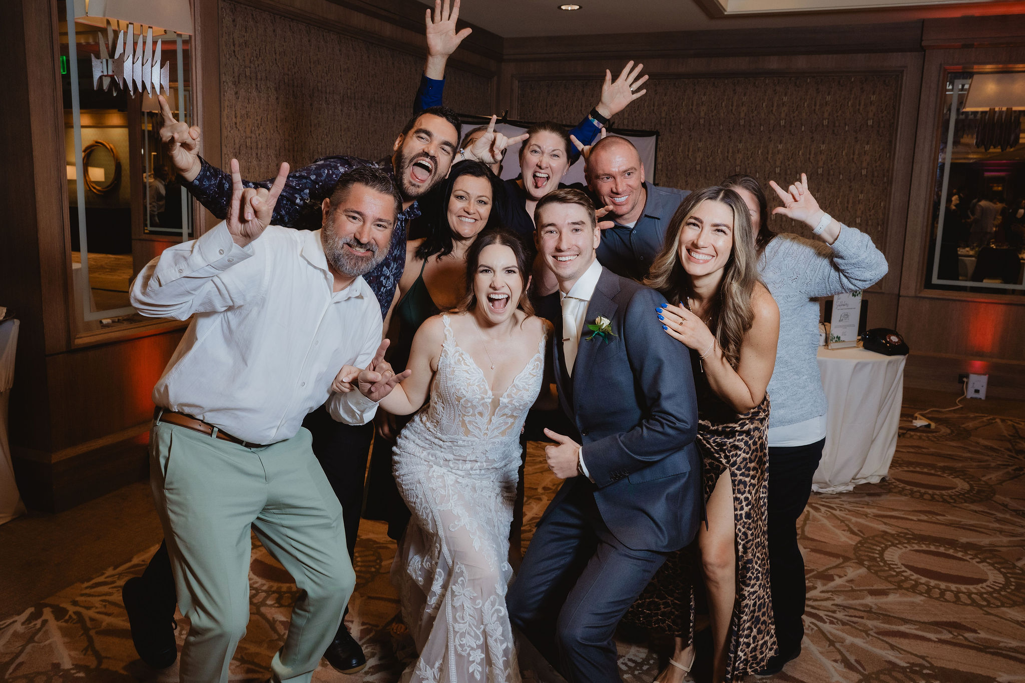 Brittney and Trevor with guests during the table photo dash