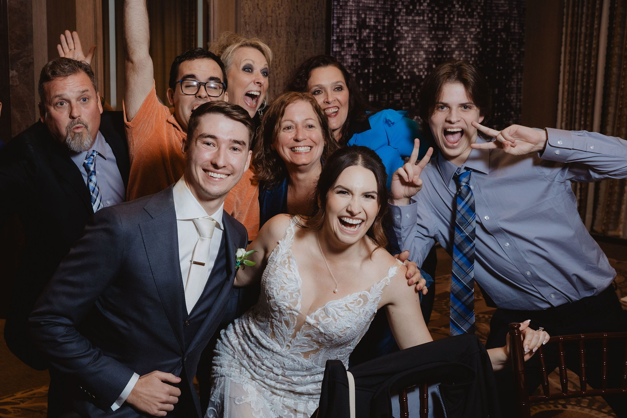 Brittney and Trevor with a lively reception table group