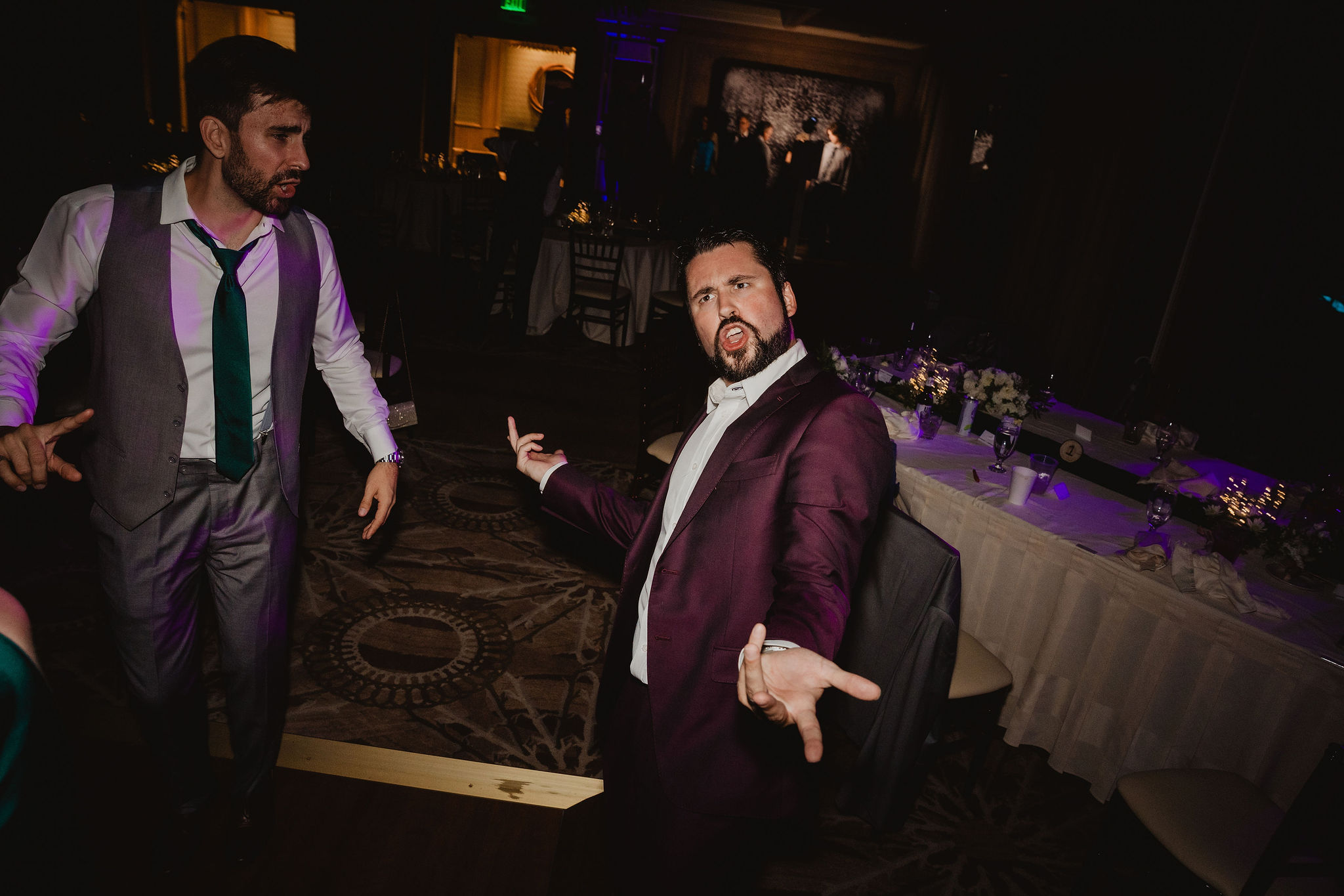 Guest dancing with dramatic reception light
