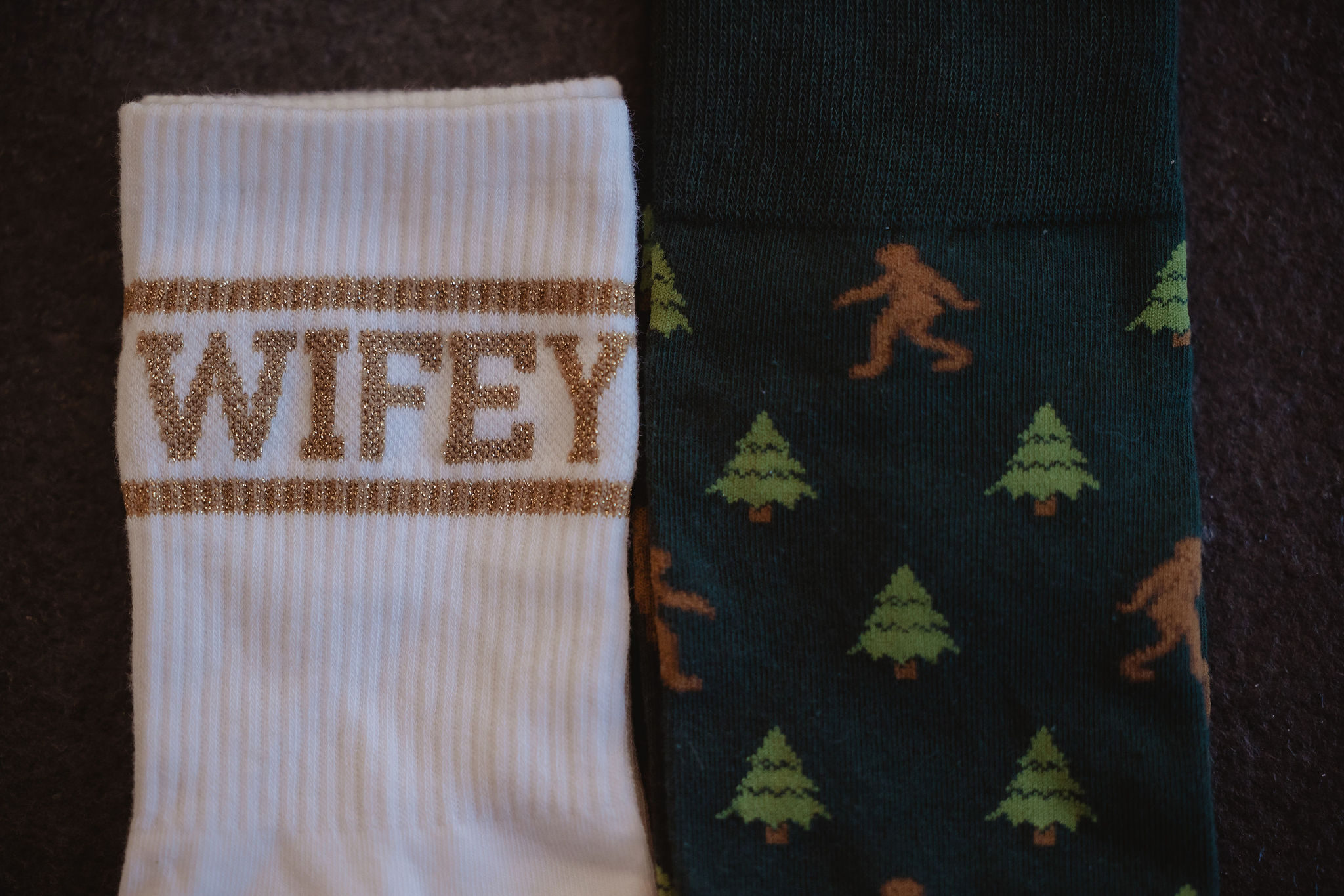 Groom details with pine tree socks before the Flagstaff wedding