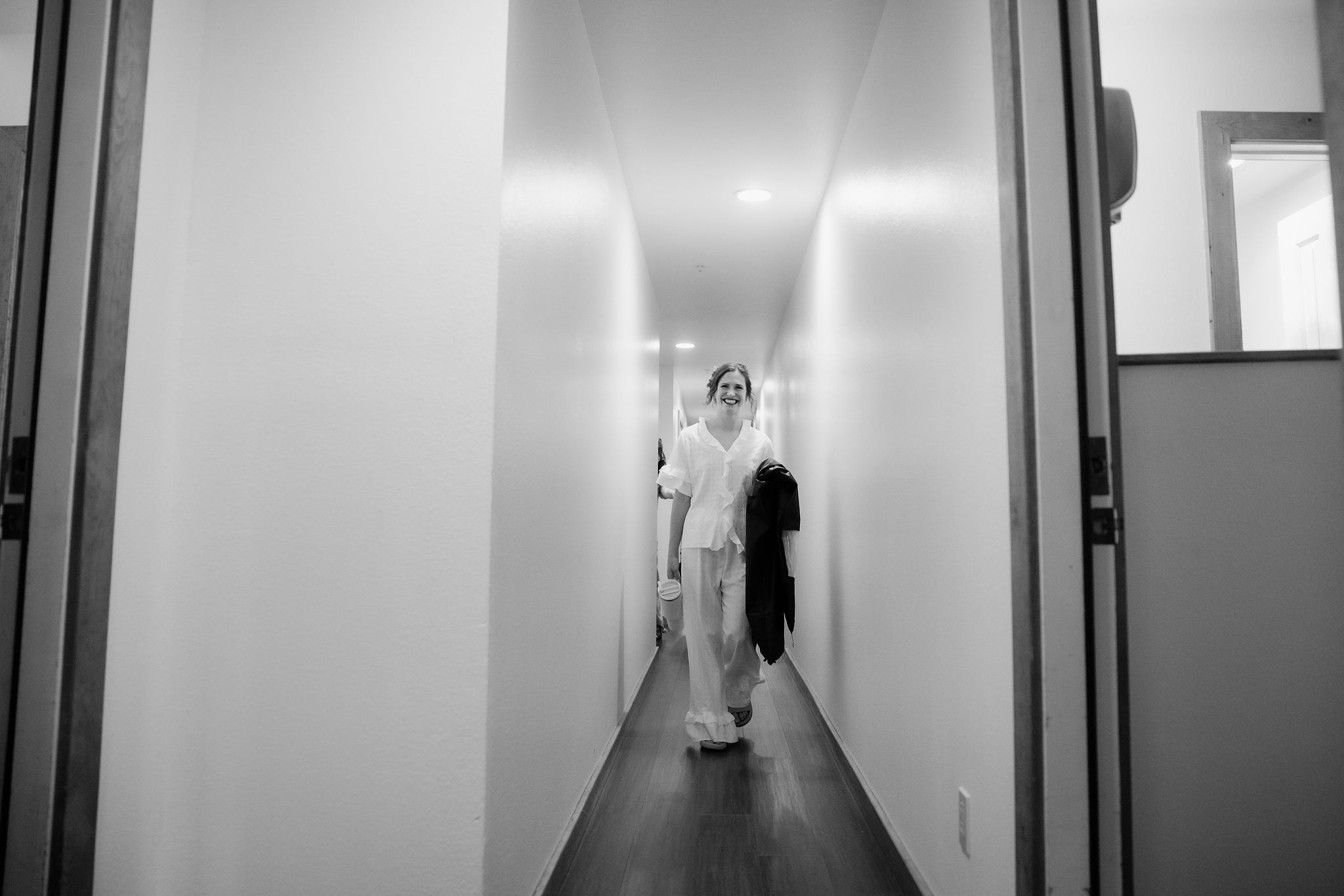 Black and white hallway portrait before the wedding