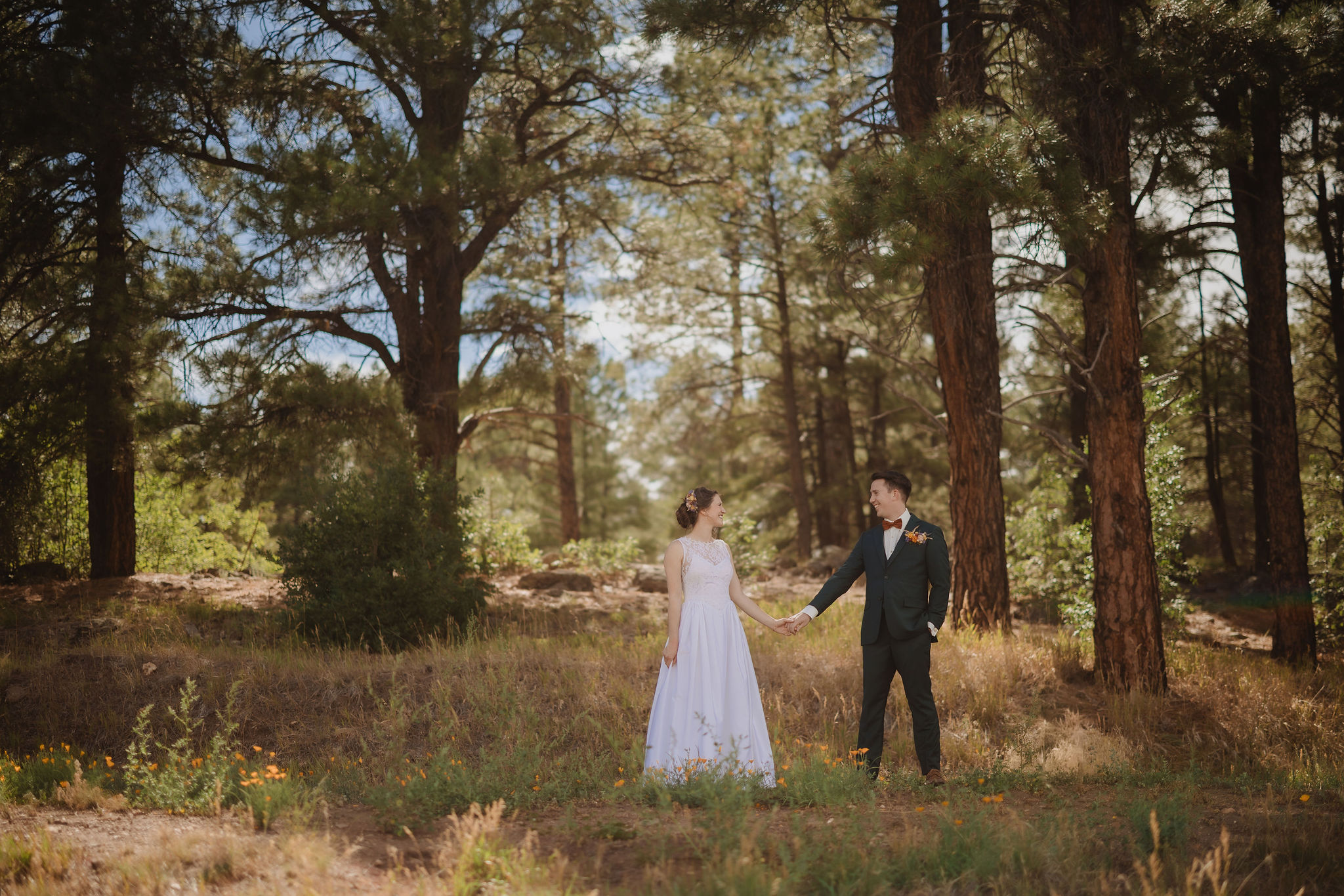 Kellie and Jake wide forest portrait at Aldea in the Woods
