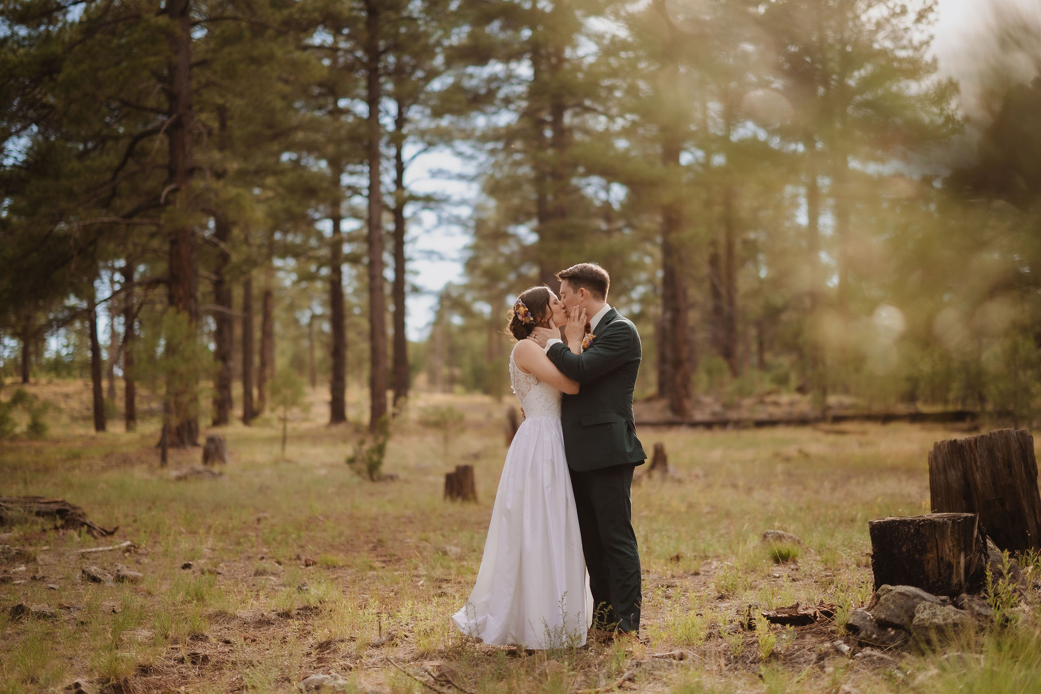 Kellie and Jake golden hour portrait in the pines