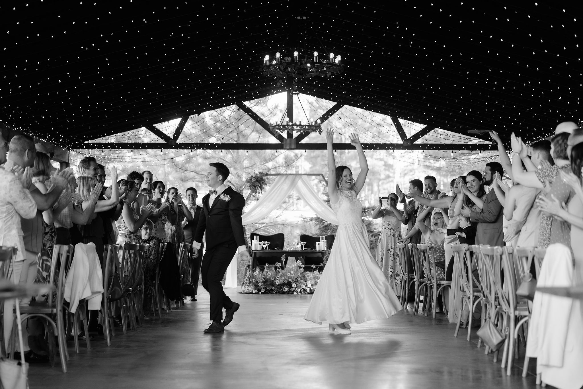Black and white grand entrance during Kellie and Jake’s reception