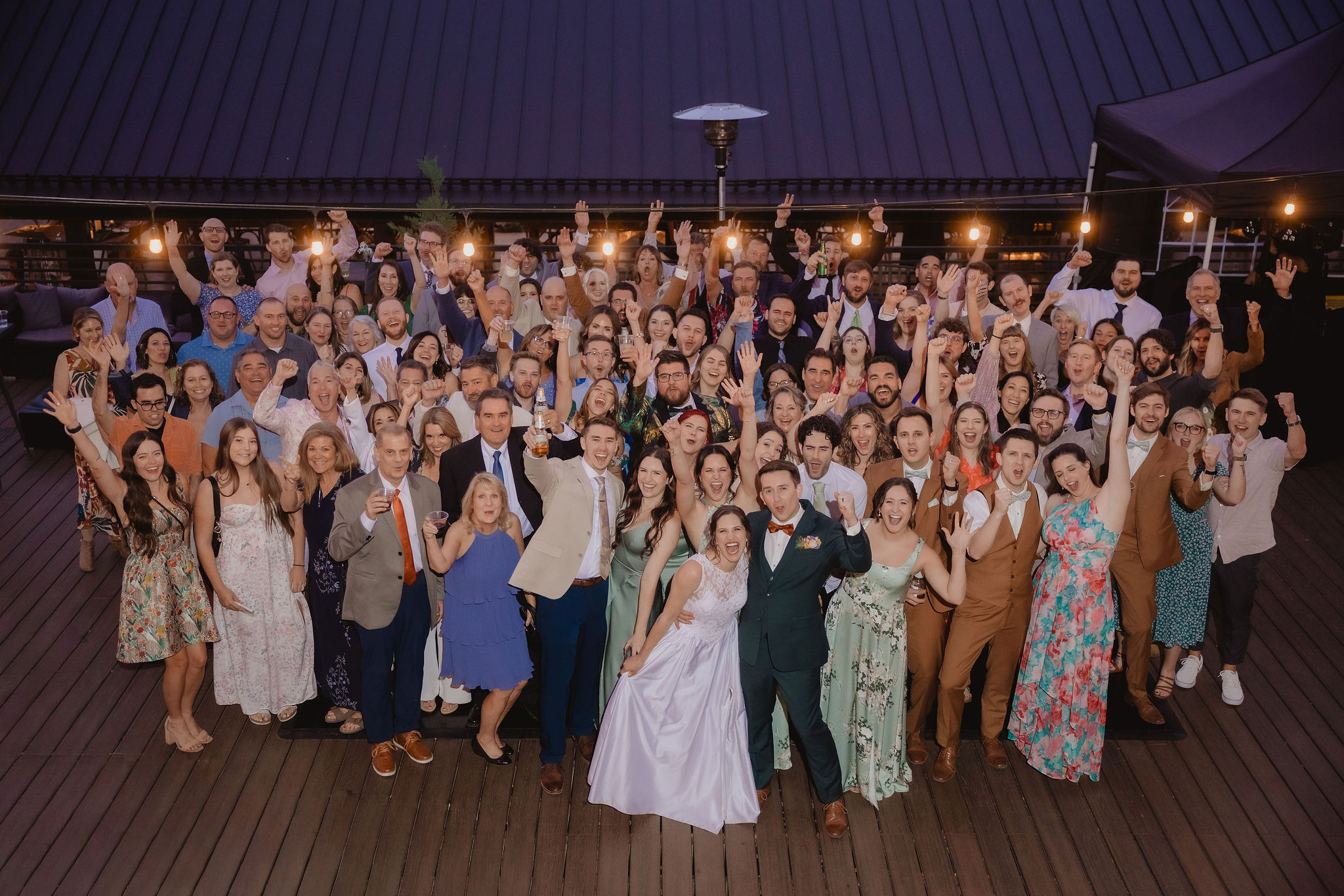 Large group photo with Kellie and Jake’s wedding guests