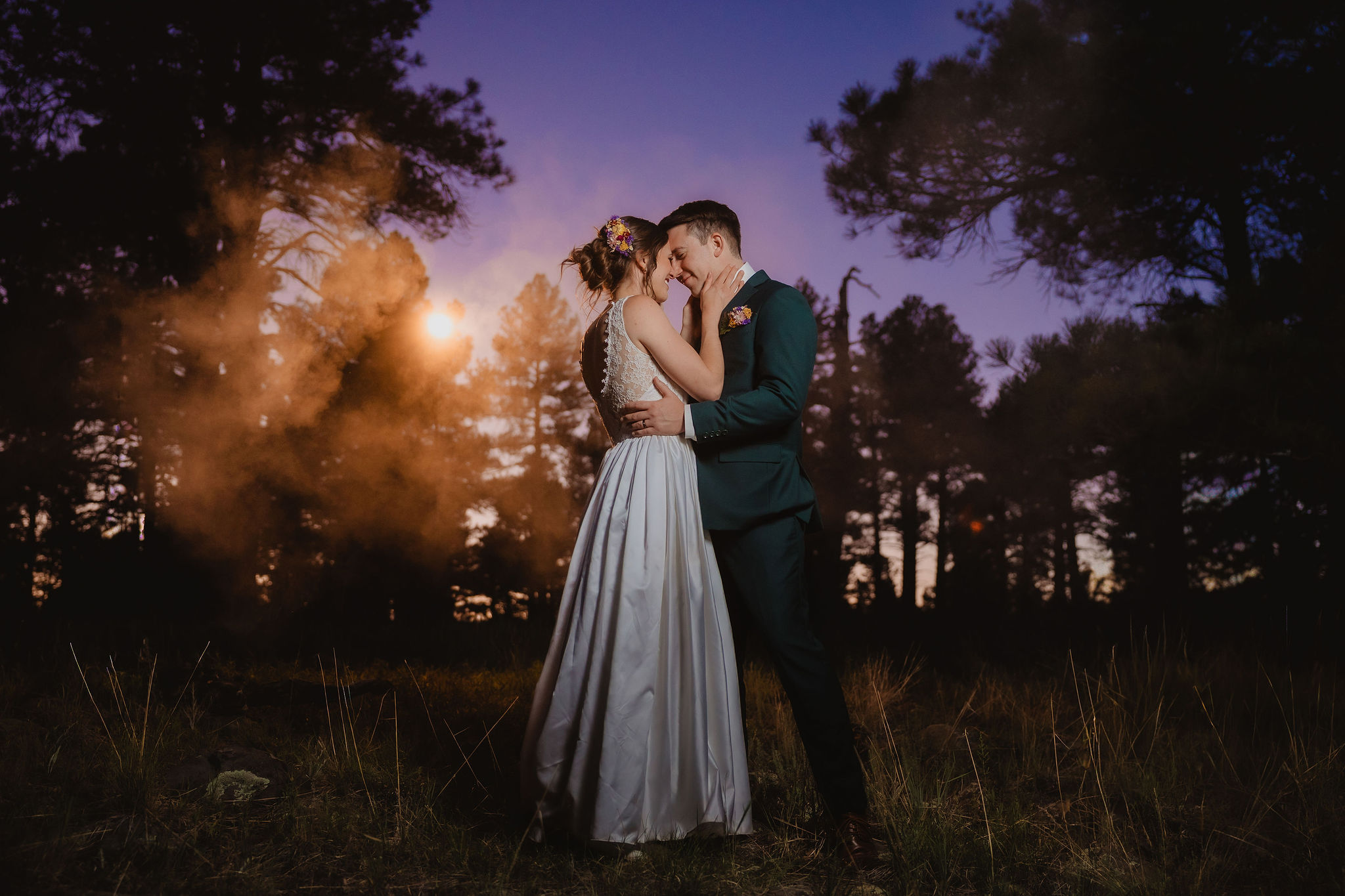 Night portrait of Kellie and Jake with dramatic light in the woods