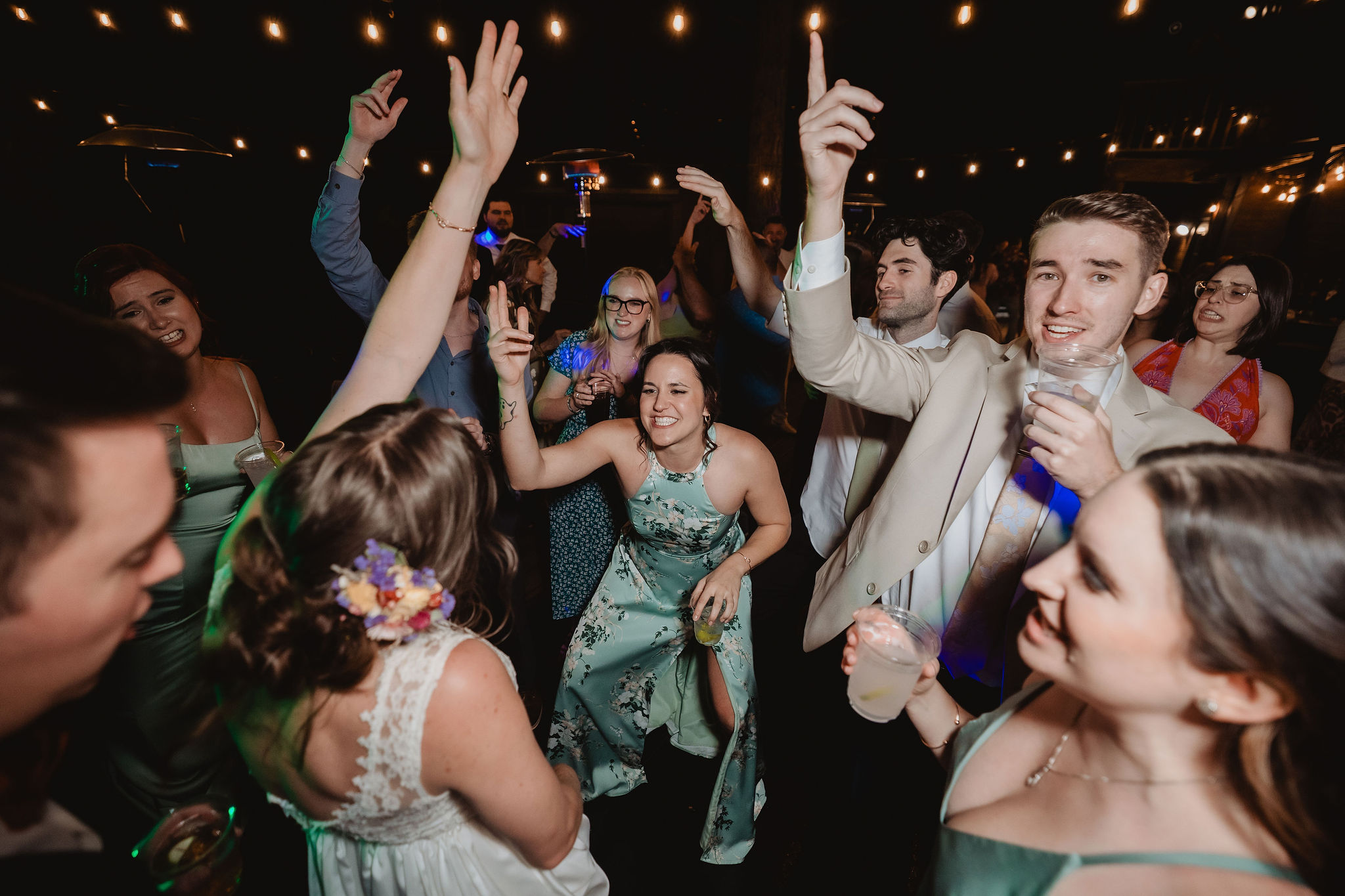 Wedding guests dancing to Rock Lobster at the reception