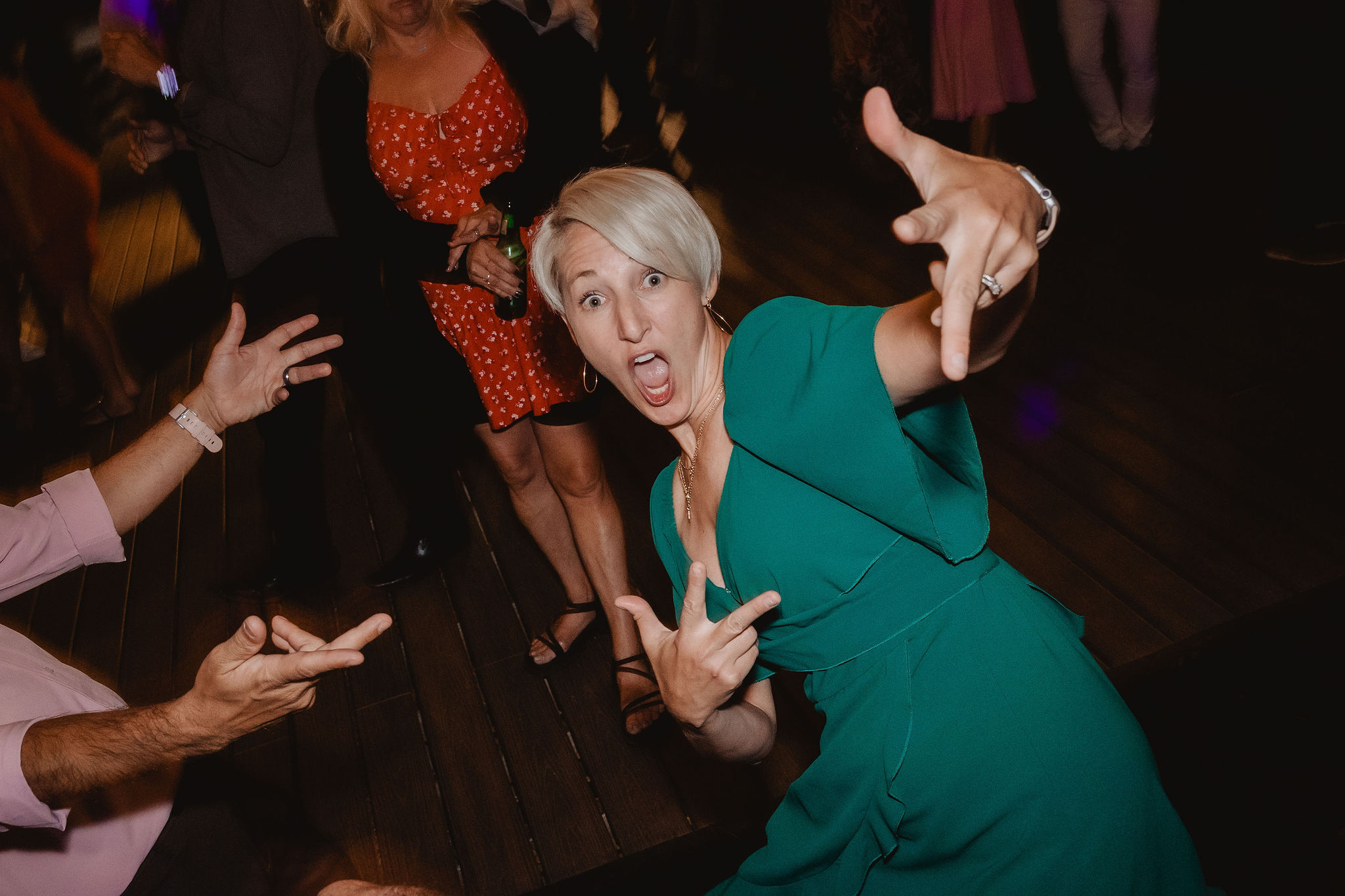 Guest dancing in tribute to Rock Lobster at the reception